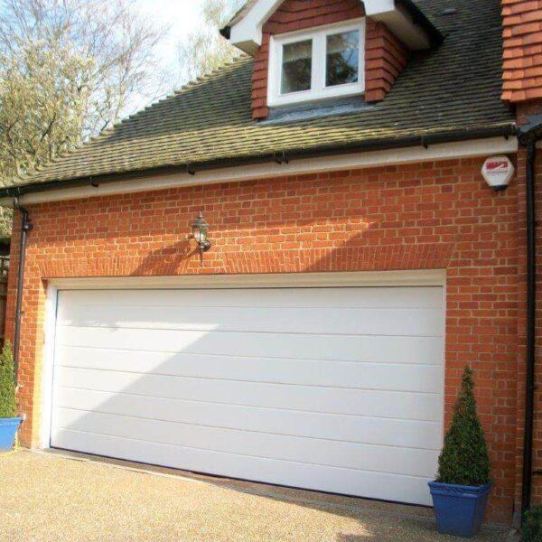 Kaip įrengti garažo vartus privačiame name?